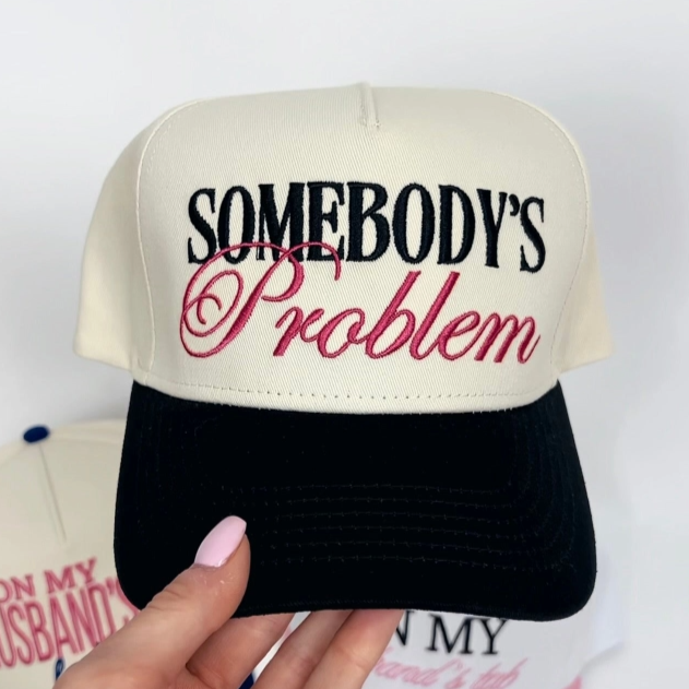 Black & Pink Embroidered "Somebody's Problem" Trucker Hat