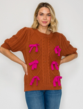 Orange Sweater with Pink Bows
